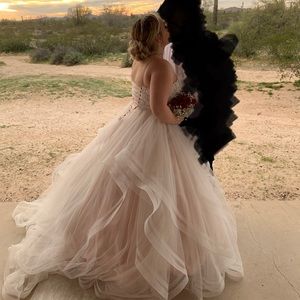 This is a ballerina pink wedding dress